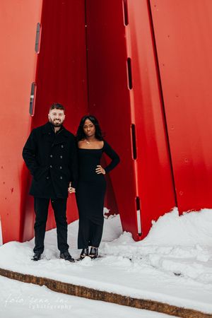 couple standing in snow