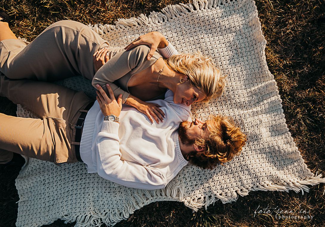 Couple laying on blanket, Cedar Rapids, IA