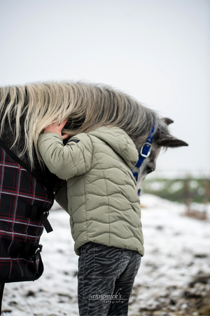 A series of photos showing a beige puffy vest against a snowy winter background.