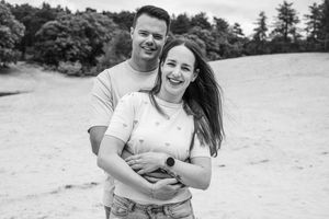 Black and white portraits capturing authentic moments of connection outdoors.