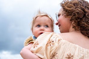 Close-up shots of joyful expressions against a bright sky background.