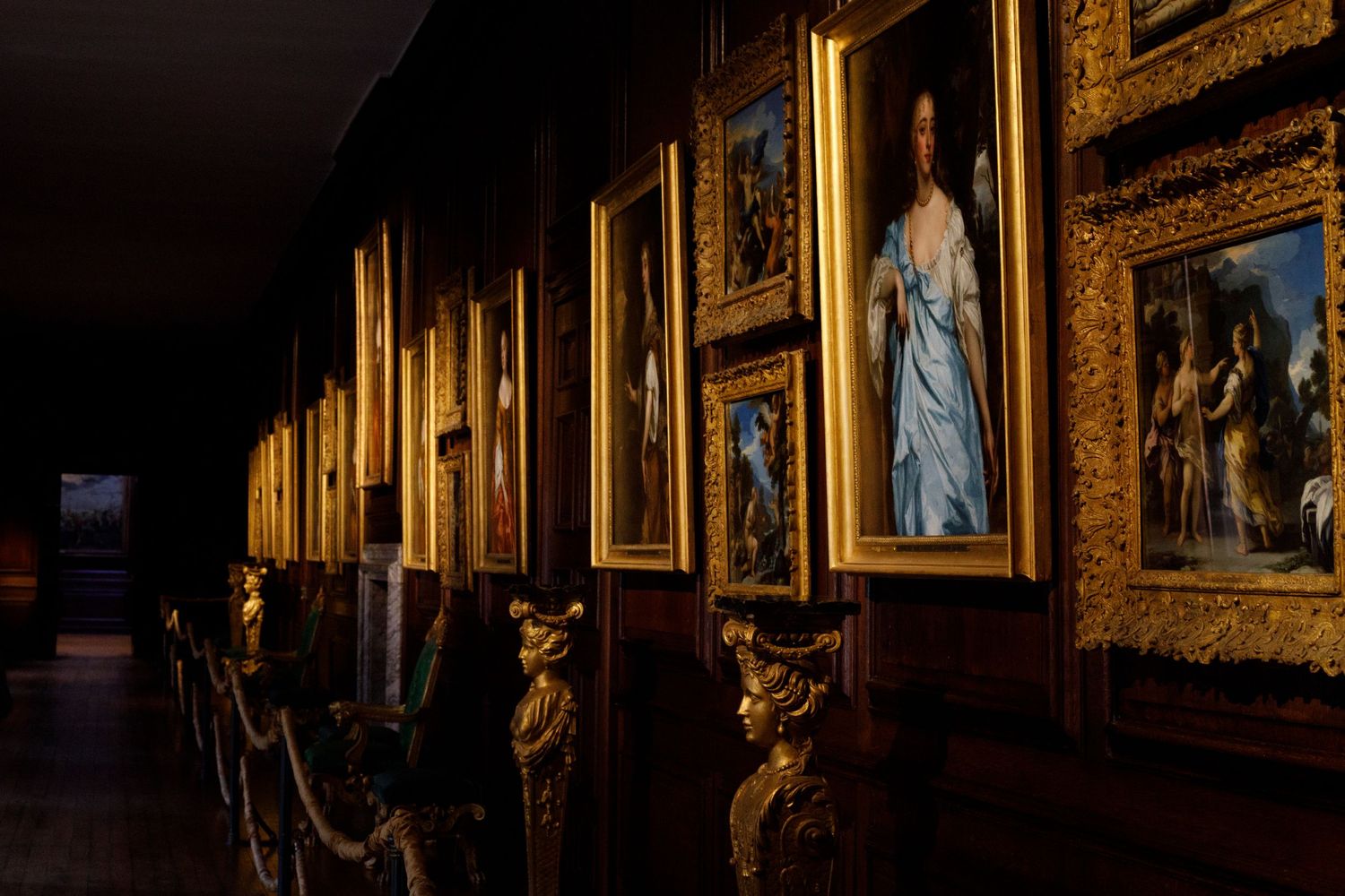 Hampton Court - Cumberland Art Gallery- Paintings in golden frames lined down a hall
