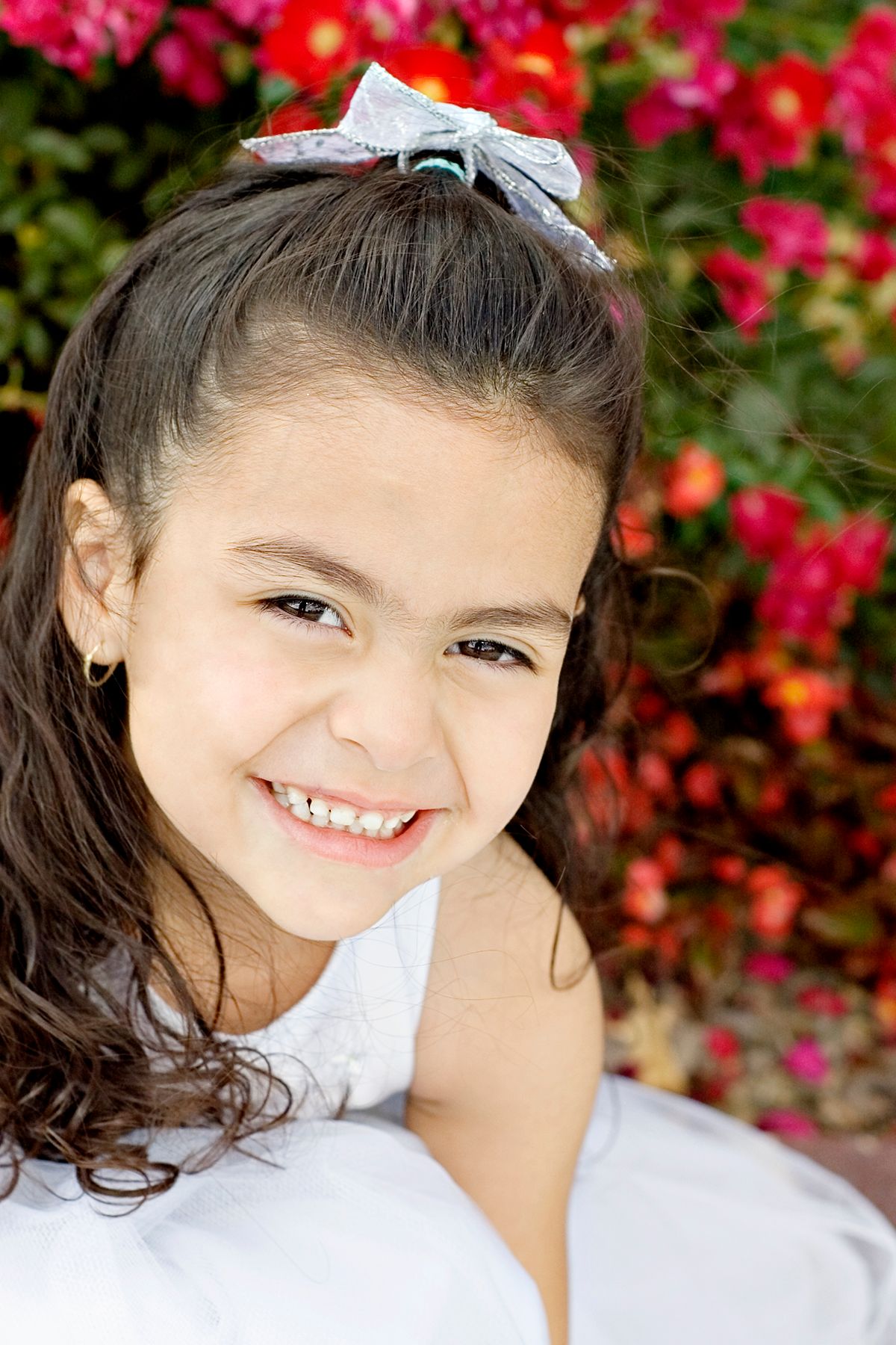smiling kid wearing a dress