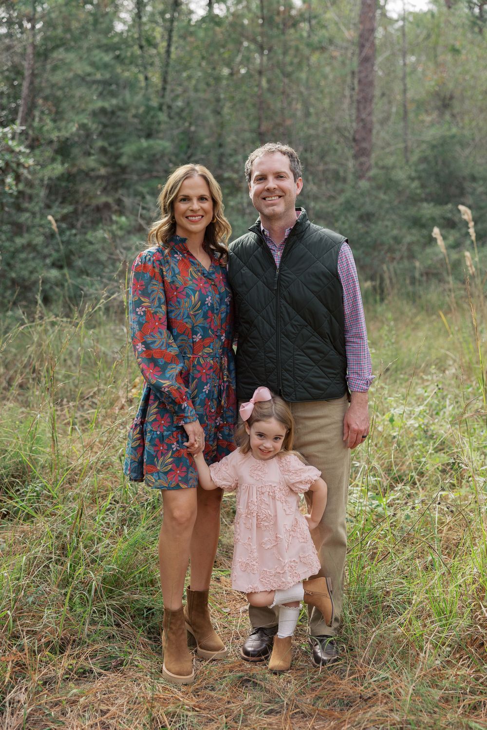 Three related outdoor portraits taken in a wooded setting with tall grass and pine trees in the background.