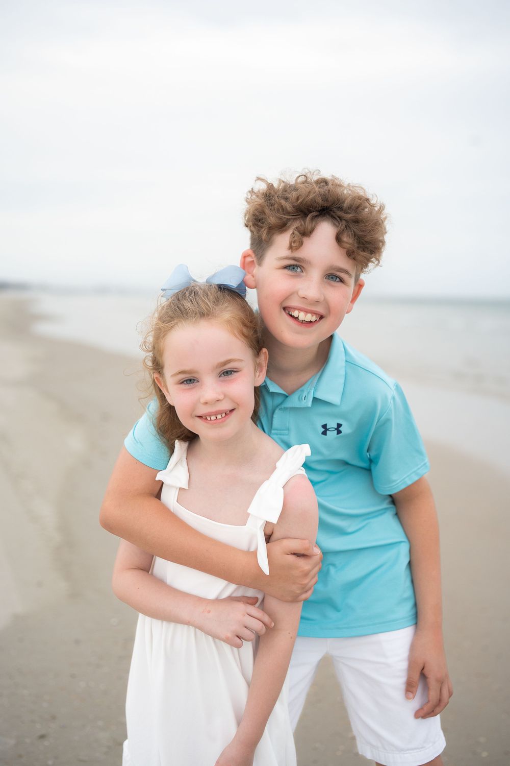 Family on the beach at golden hour in Melbourne on Florida's Space Coast