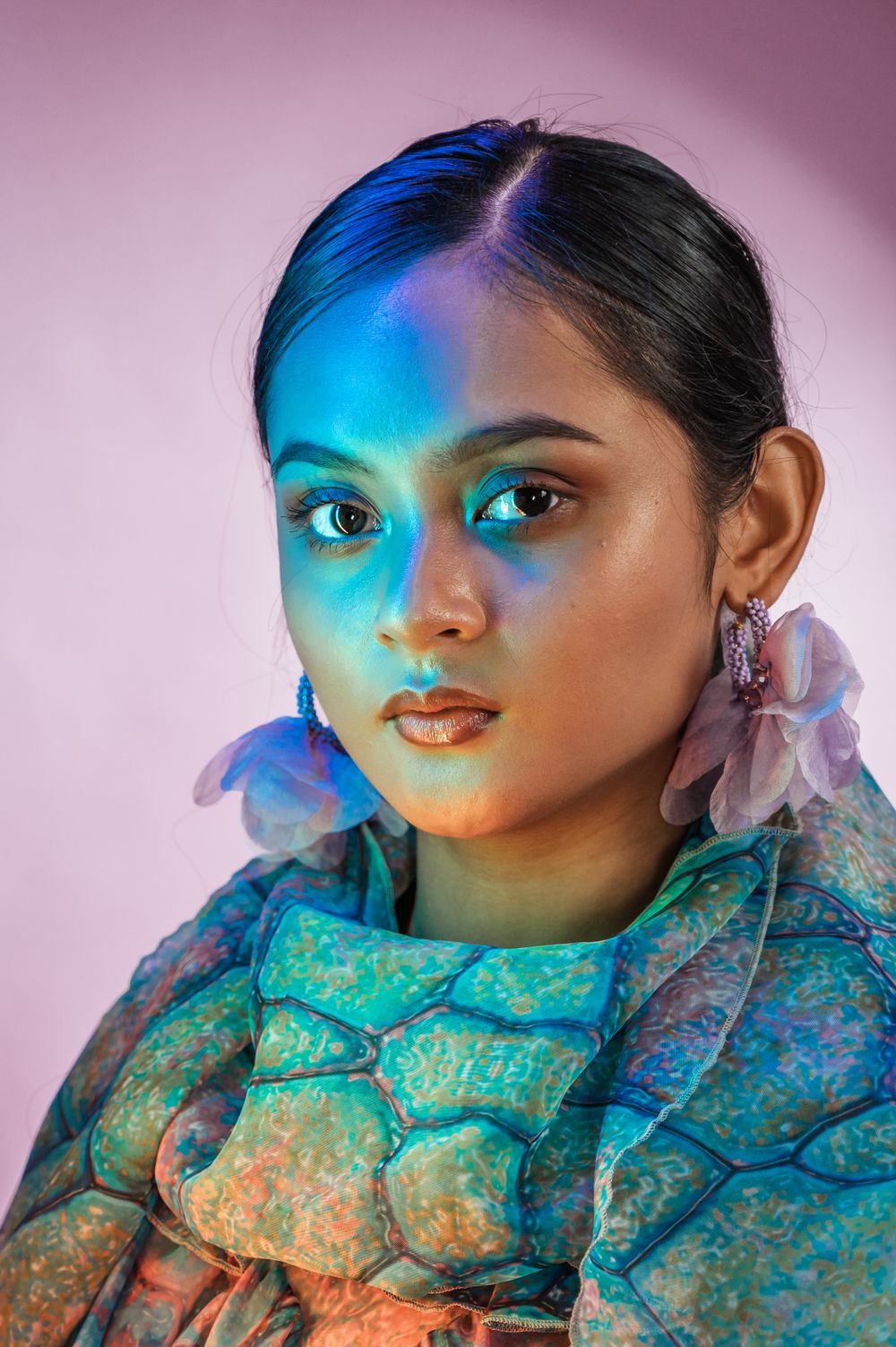 Dramatic colourful portrait of a young woman wearing floral jewellery and shimmering dress. SIX84 Photography, Portrait Photography, Sydney