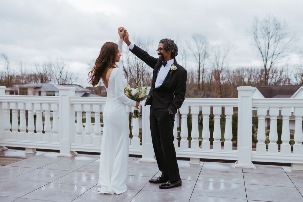 Bride and groom dancing on their wedding day in Zionsville, Indiana at Holliday Farms