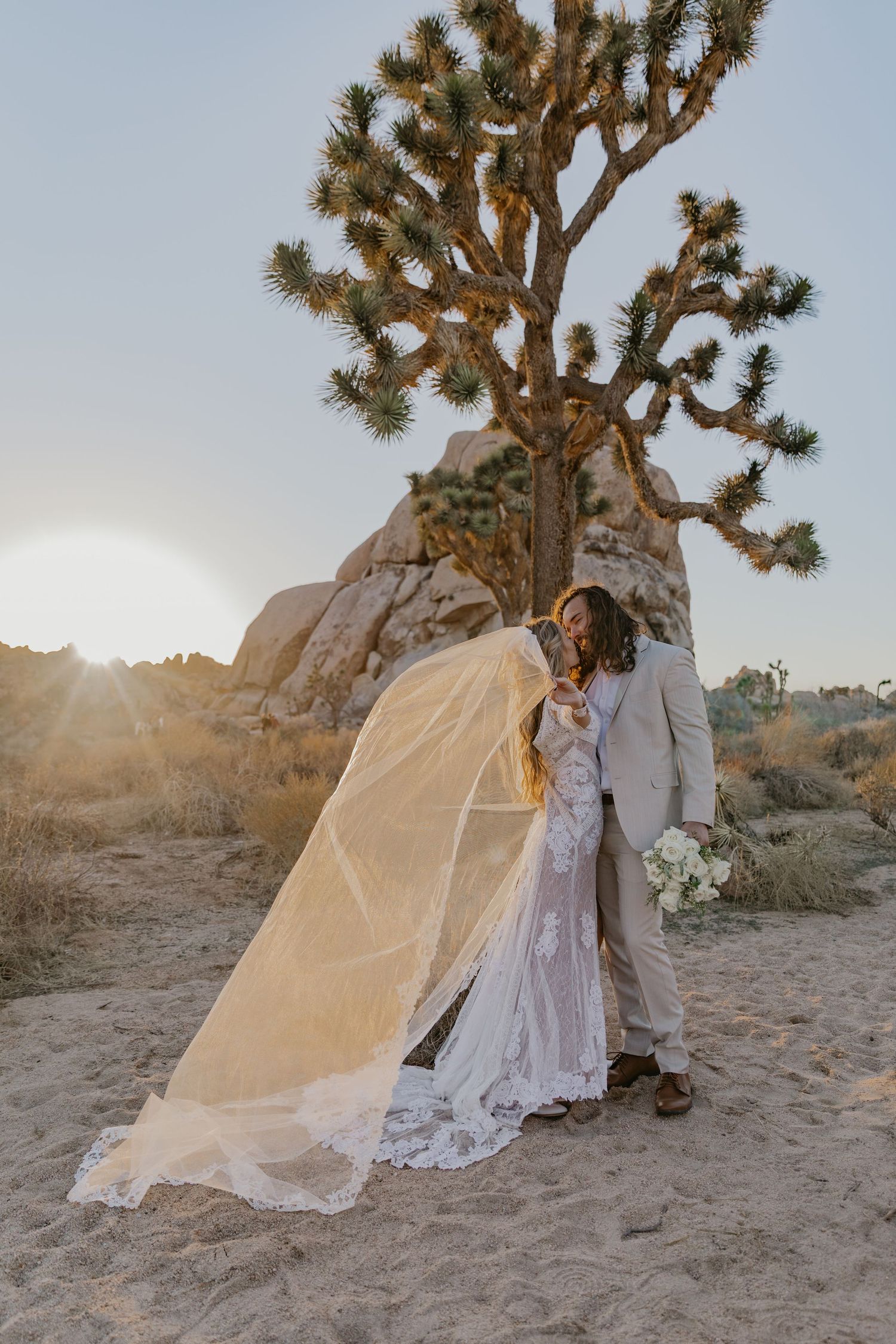 Orlando luxury wedding photographer romantic desert wedding photoshoot with bride and groom.
