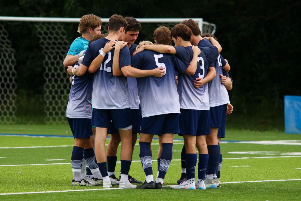 Soccer team huddle