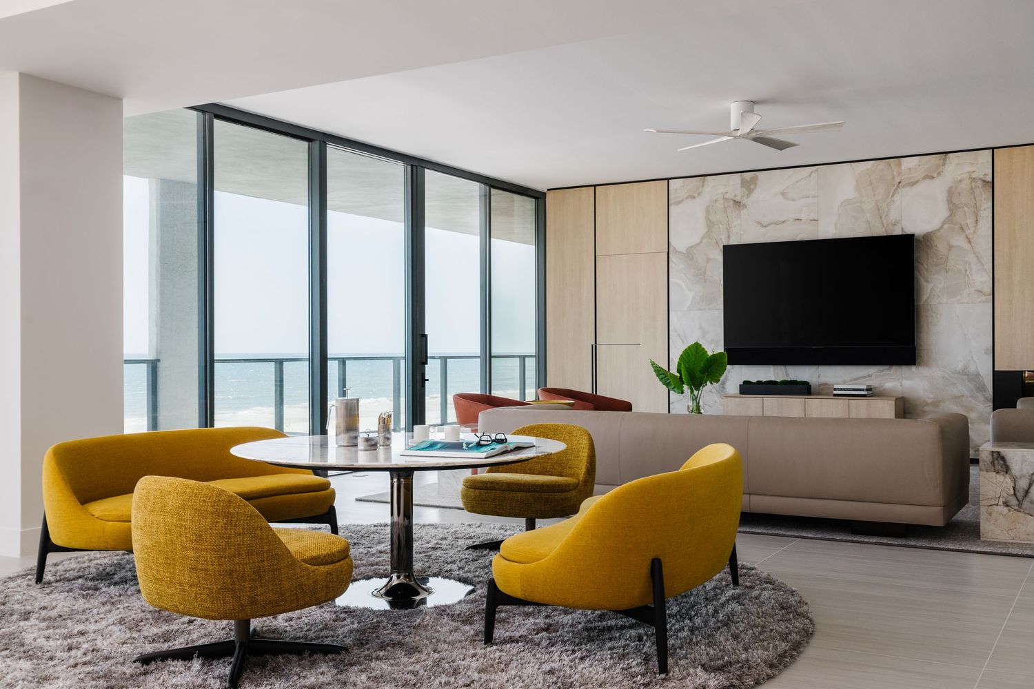 Modern living room decor and scultpural chairs.