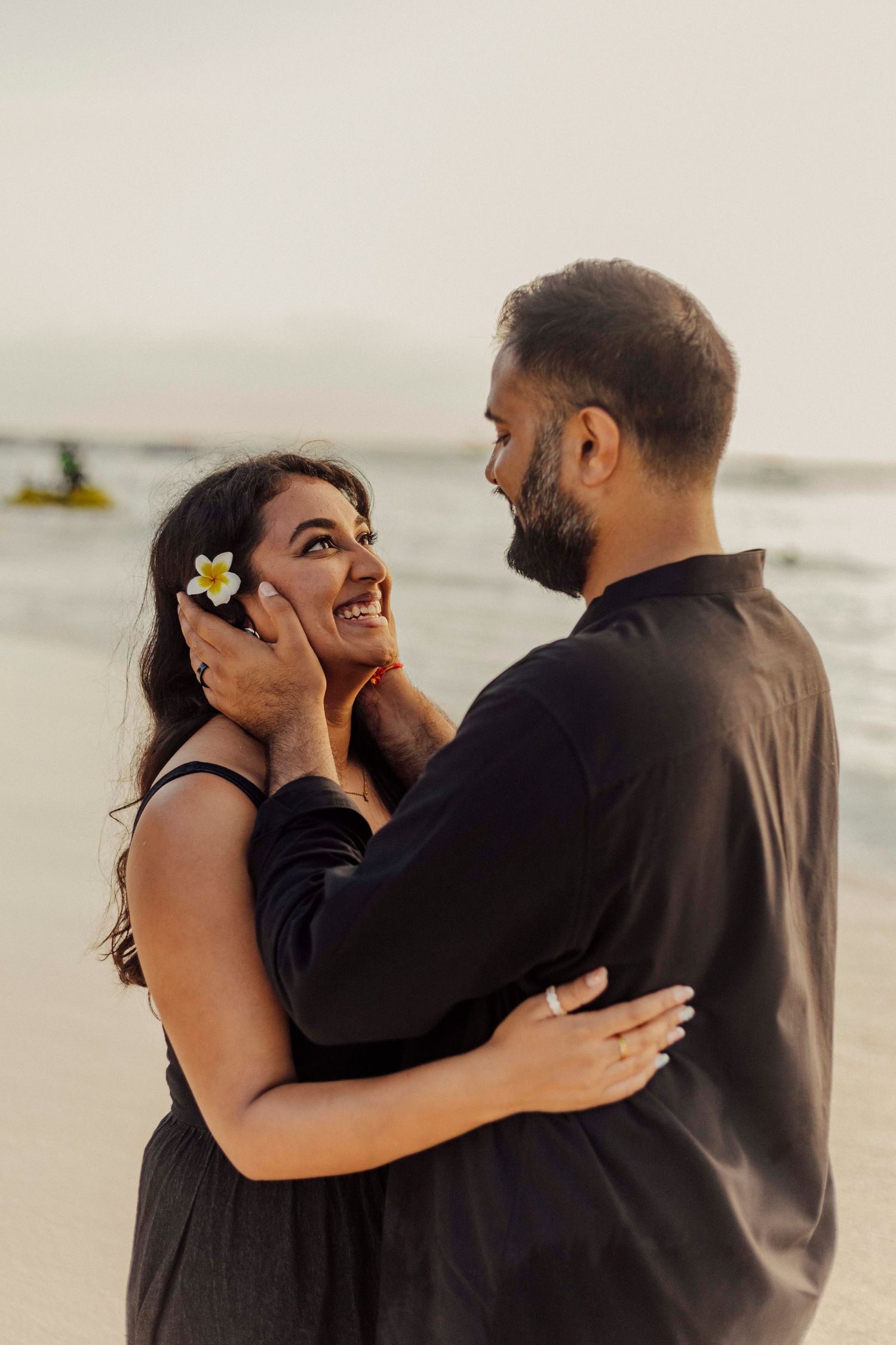 Elegant beach couple photography in Zanzibar with soft sunset tones