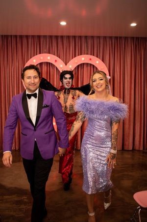 Bride and Groom walking down aisle with Elvis at Sure thing chapel Las Vegas