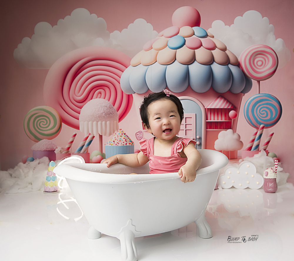 Candy land first birthday photoshoot for babies in Croydon Melbourne, including cake smash, bath splash and joyful milestone photography at