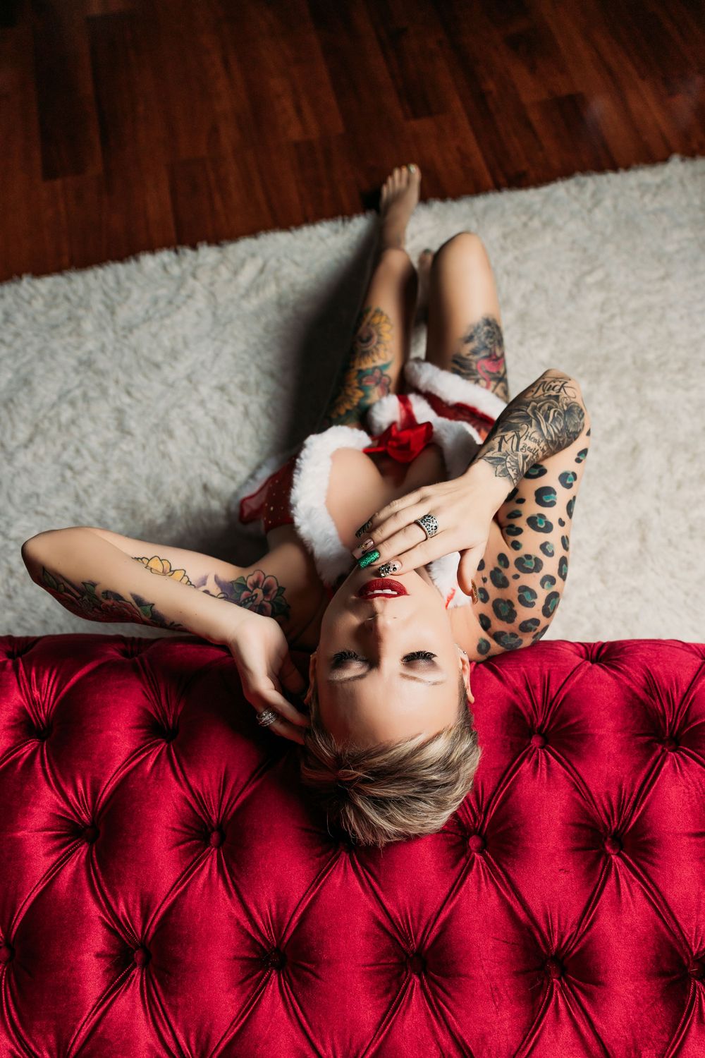 Christmas set with red couch Santa outfit tattoos