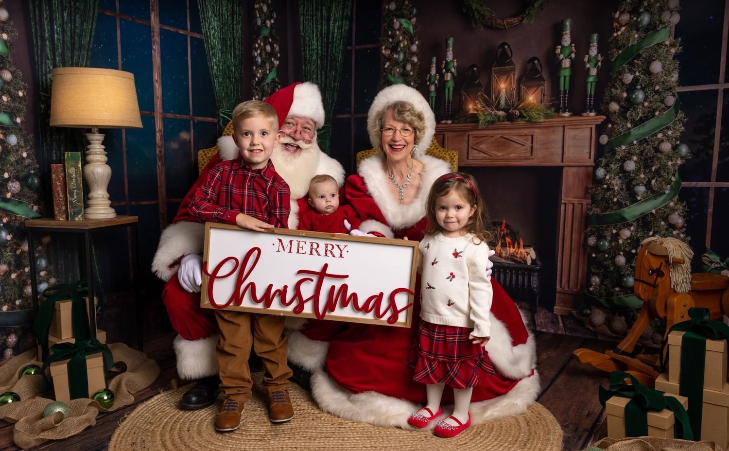 A festive holiday photo showing Christmas decorations and Santa in Knoxville TN Christmas Santa photography session