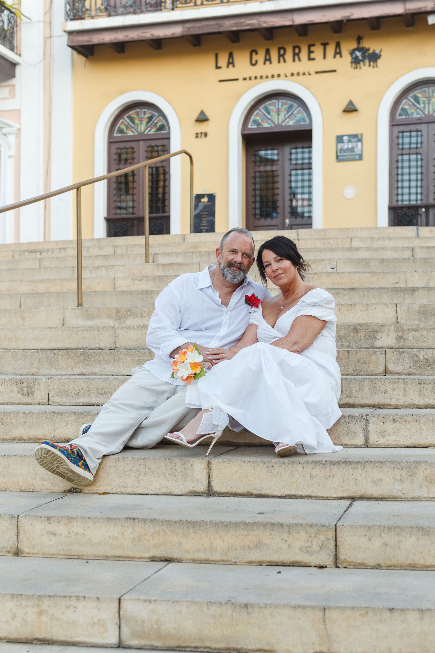 Wedding portrait. Seated on stairs in Old San Juan, Puerto Rico.