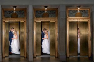 A series of wedding photos displayed in ornate gold frames along a wall showing a bride and groom in various poses.