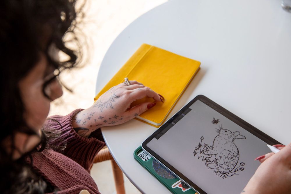 Cincinnati branding session for tattoo artist at Chasing Cali Collective capturing creative artwork and professional portraits.