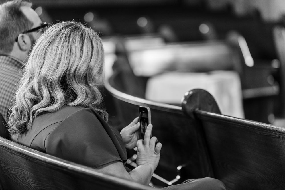 Black and white panoramic collage showing preparations and moments from an emotional wedding day celebration.