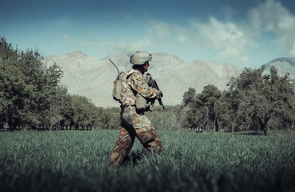 Australian soldier in a field, remembrance theme.