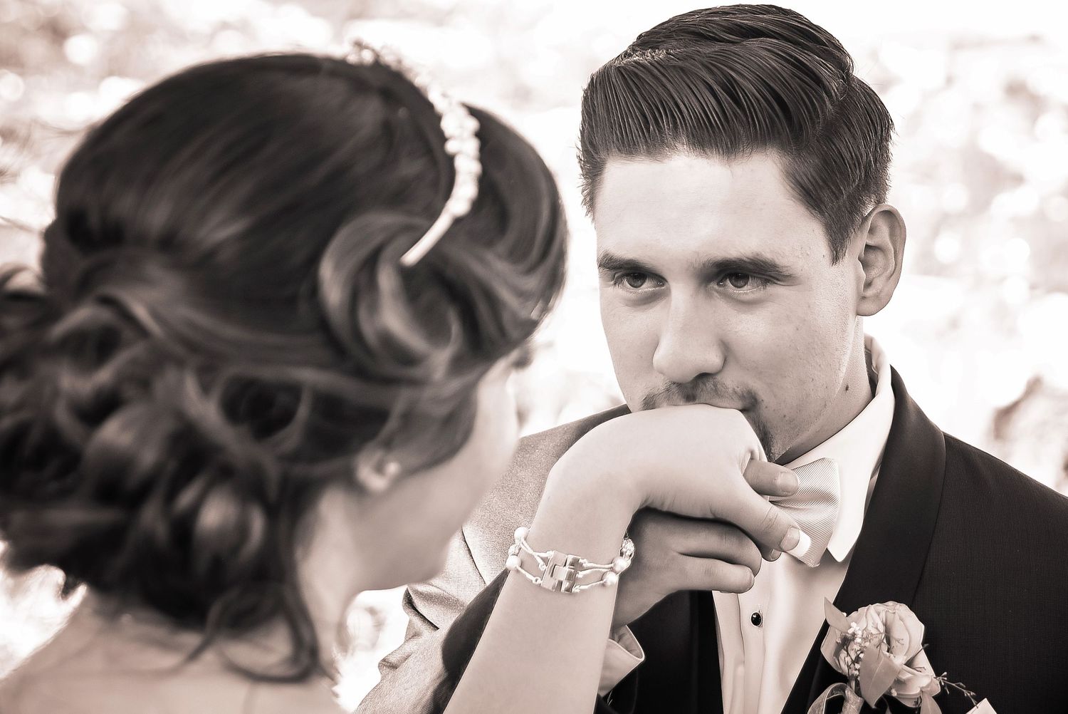 Collection of romantic sepia-toned wedding photos showing intimate moments between newlyweds.