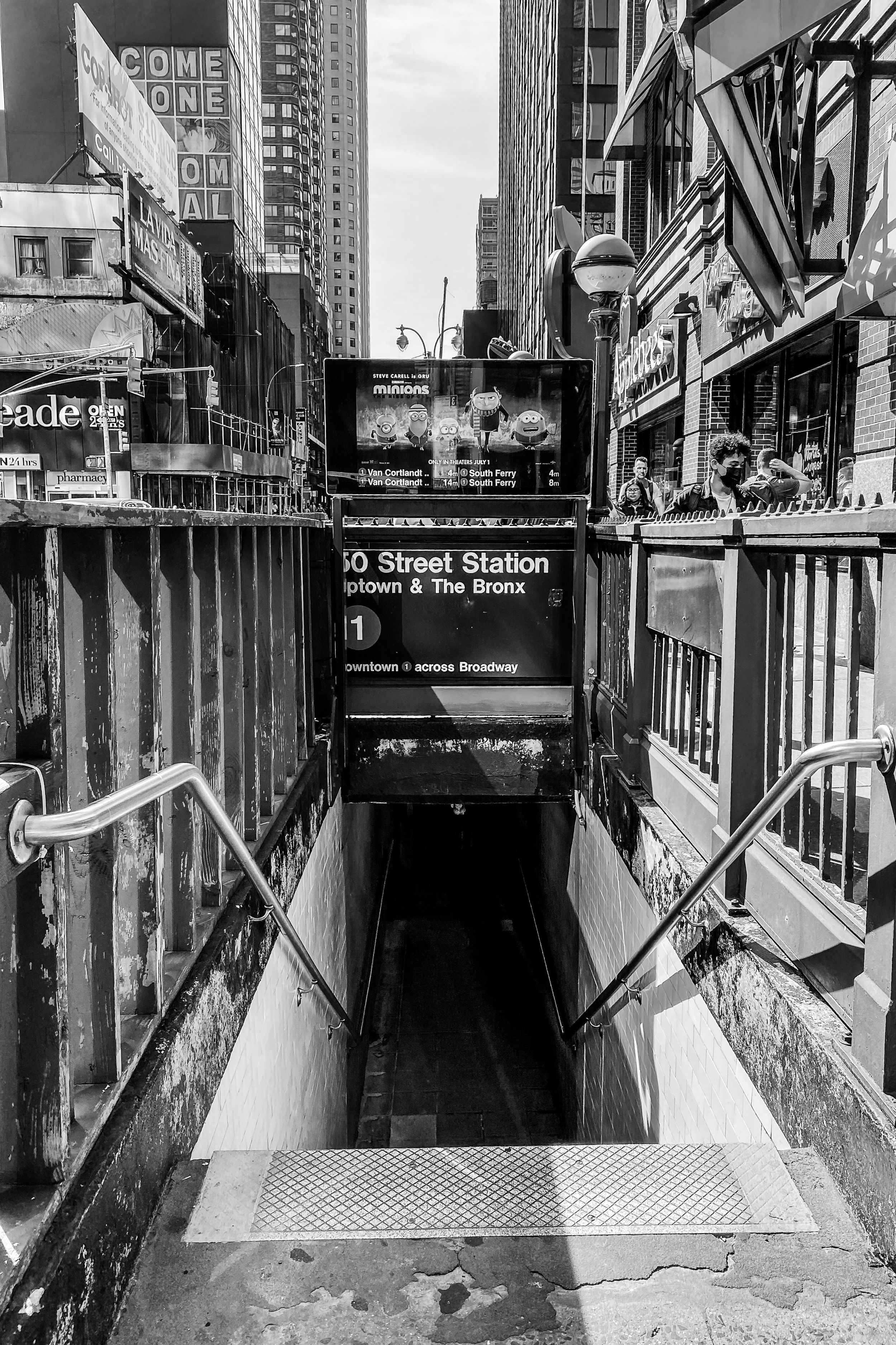 Black and white photos of New York subway station entrances with stairs descending into underground platforms.