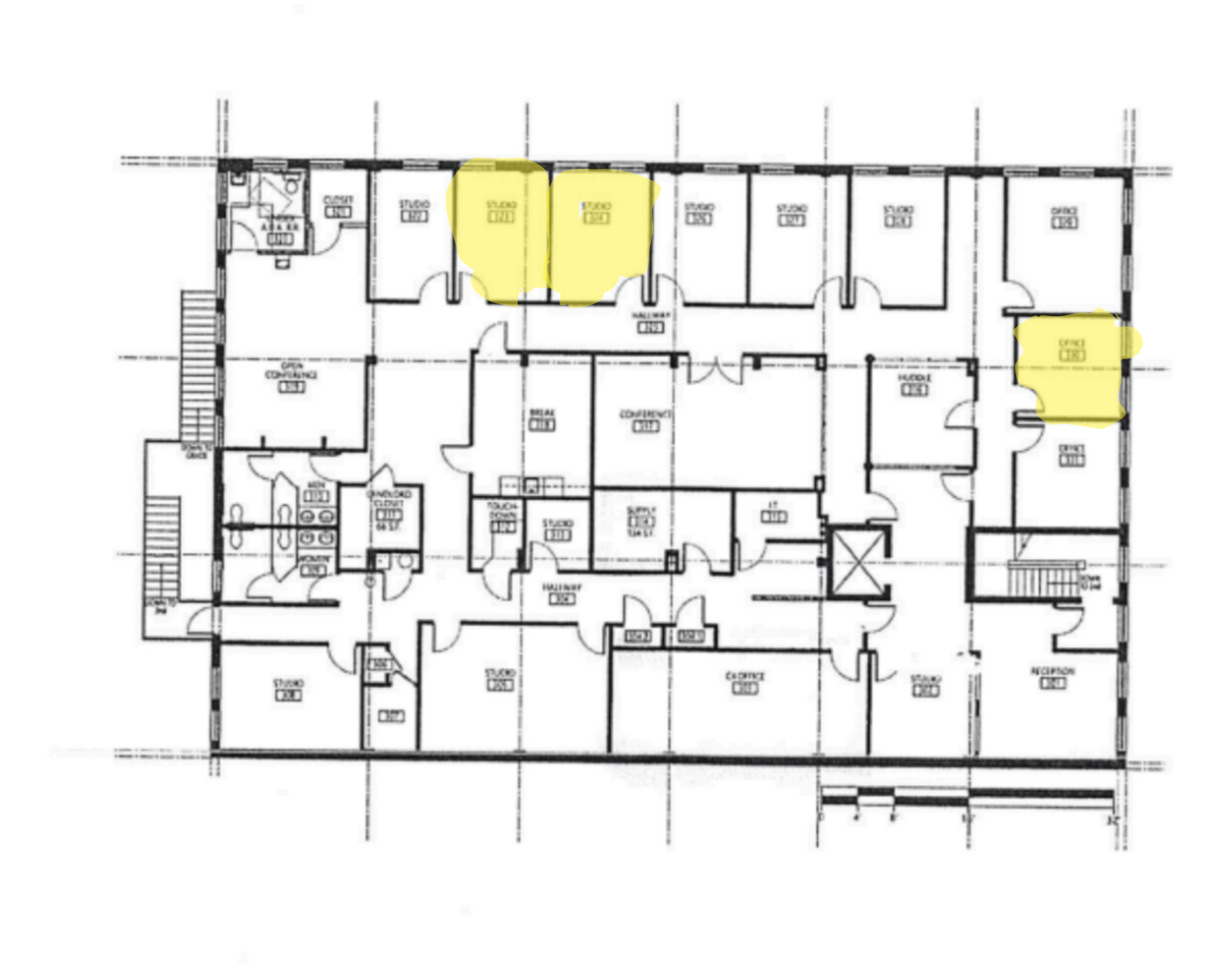 Building floor plan drawing with two units highlighted in yellow showing architectural layout and room dimensions.