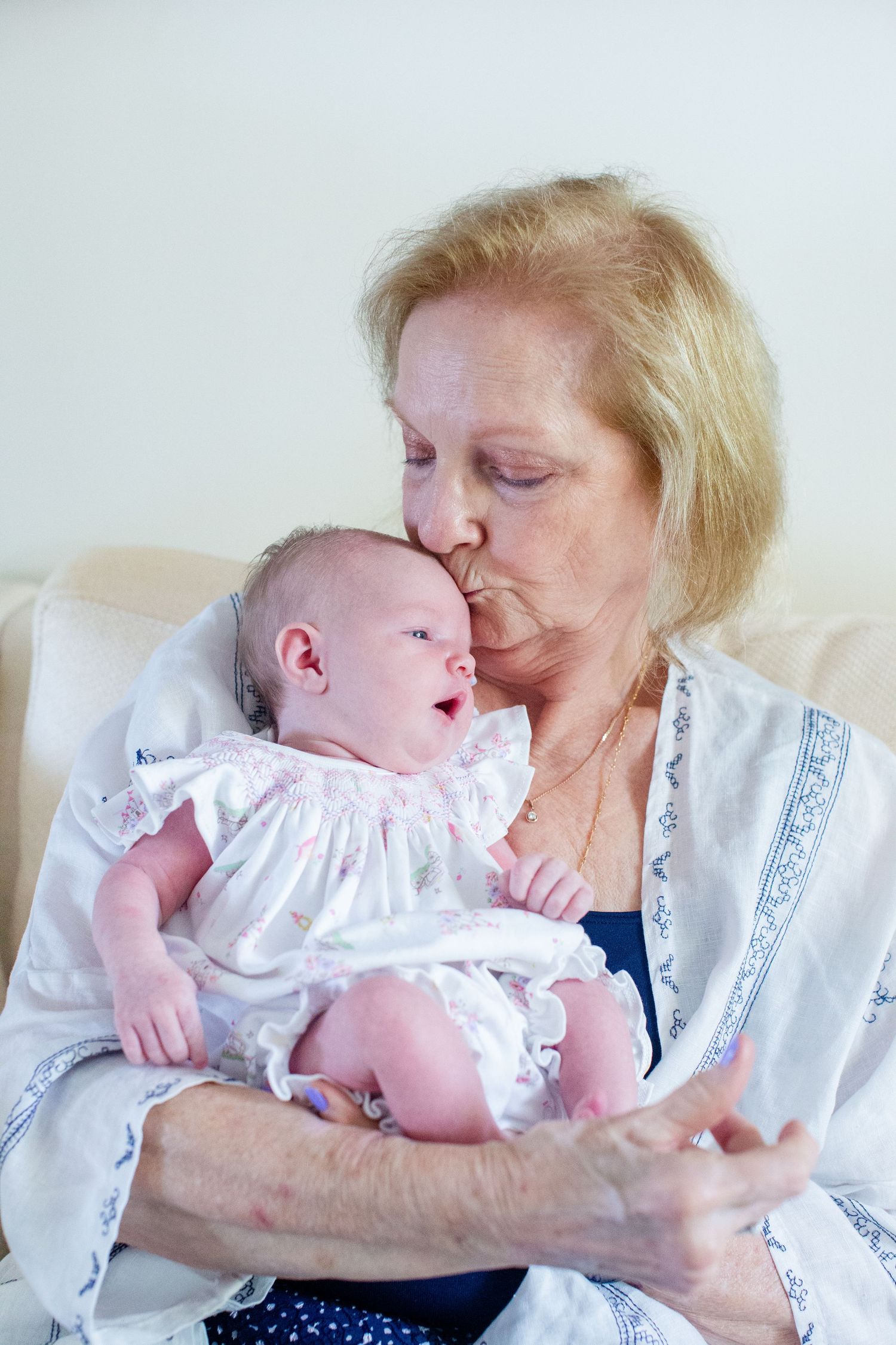 Newborn portrait. Great grandmother and baby. Guaynabo, Puerto Rico.