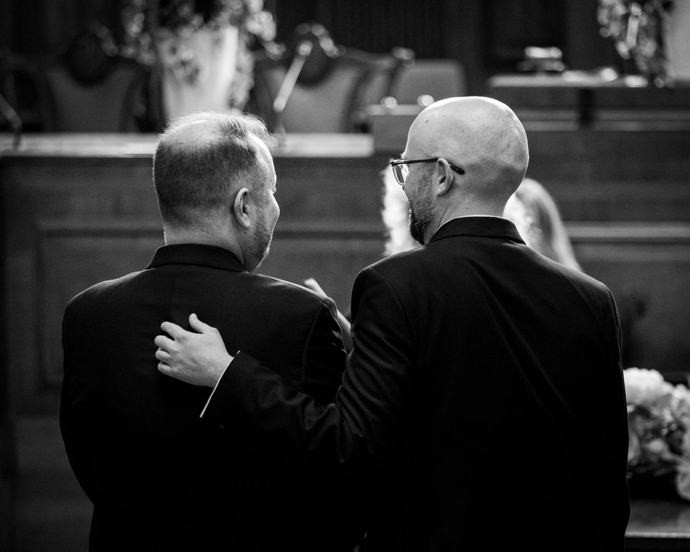 Dorset wedding photographer capturing LGBTQ+ and same-sex weddings with a fun, relaxed, and candid style full of love and joy.