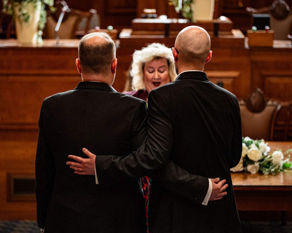 Dorset wedding photographer capturing LGBTQ+ and same-sex weddings with a fun, relaxed, and candid style full of love and joy.