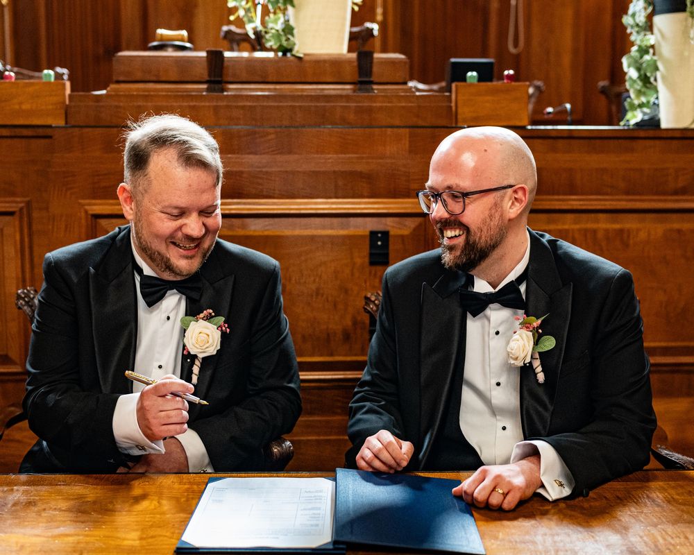 Dorset wedding photographer capturing LGBTQ+ and same-sex weddings with a fun, relaxed, and candid style full of love and joy.