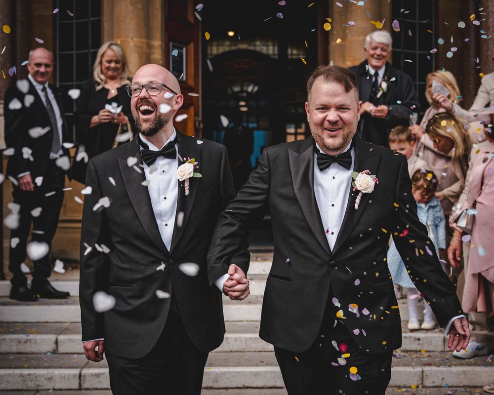 Dorset wedding photographer capturing LGBTQ+ and same-sex weddings with a fun, relaxed, and candid style full of love and joy.