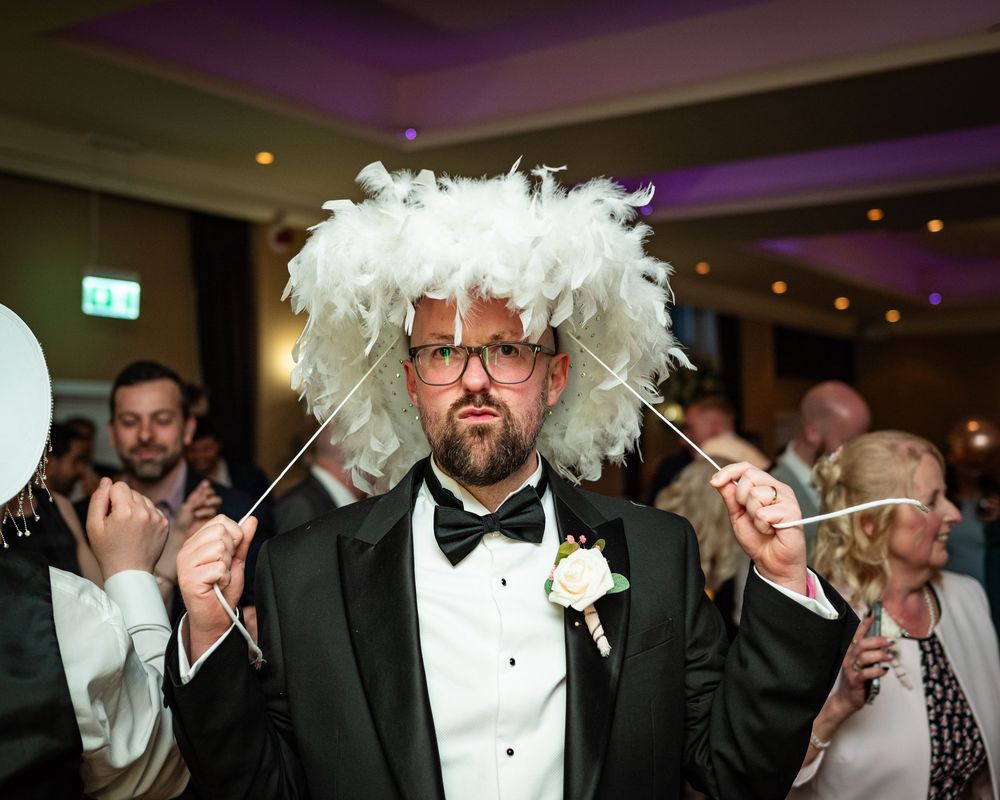 Dorset wedding photographer capturing LGBTQ+ and same-sex weddings with a fun, relaxed, and candid style full of love and joy.