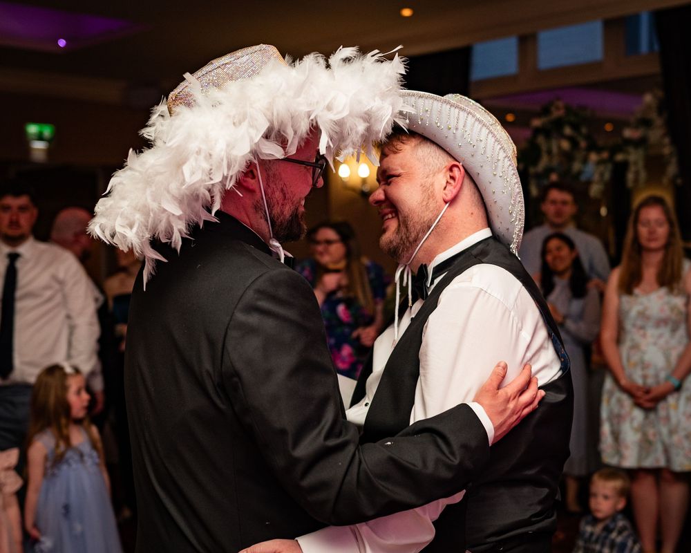 Dorset wedding photographer capturing LGBTQ+ and same-sex weddings with a fun, relaxed, and candid style full of love and joy.