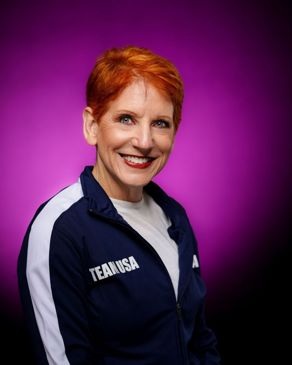 Portrait series showing expressions of joy and warmth against a vibrant purple studio background.