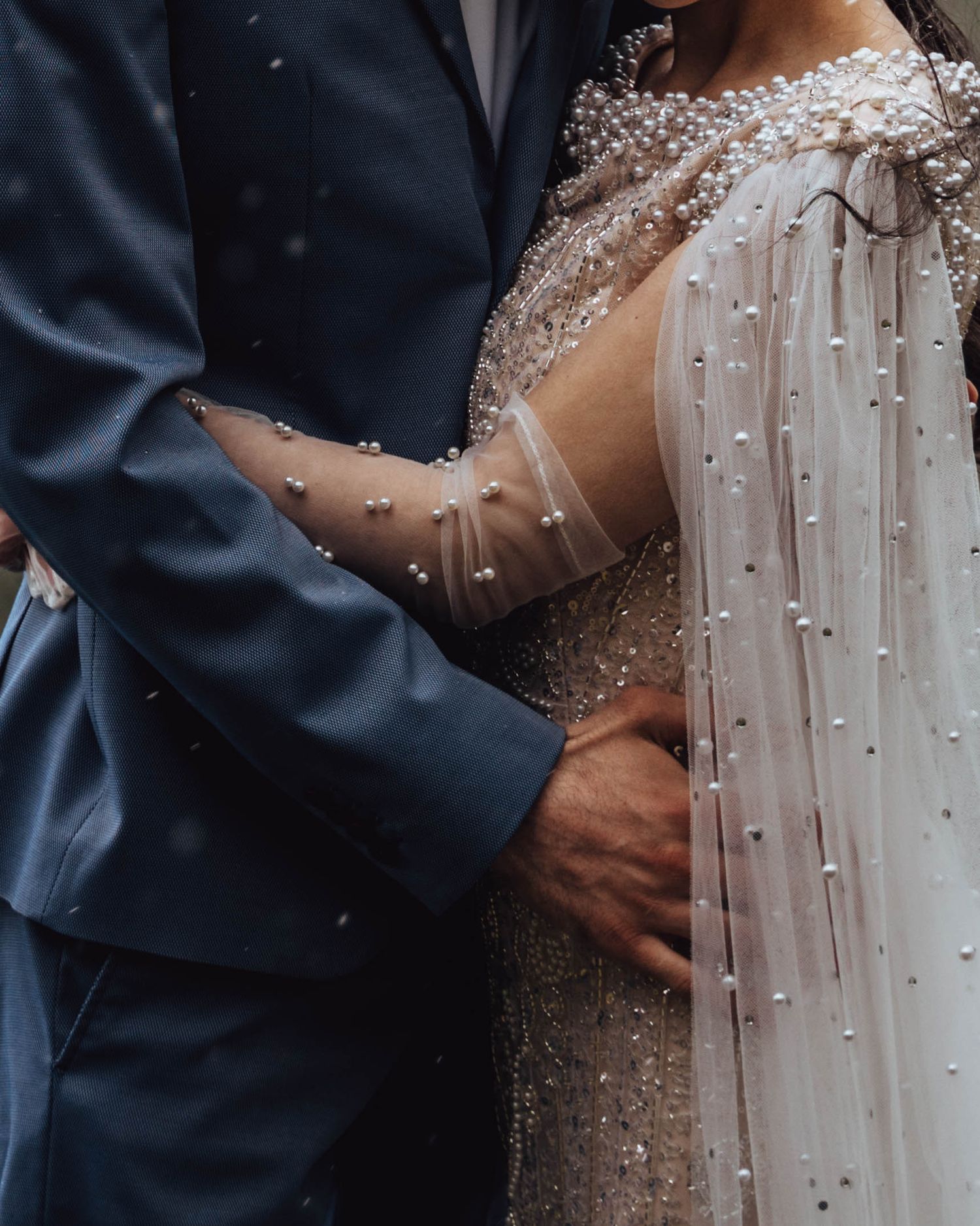 Bride's beaded wedding dress. Calgary wedding details.
