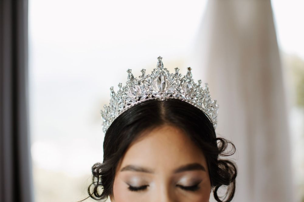 Detailed shot of sparkling crystal wedding tiara with intricate design.