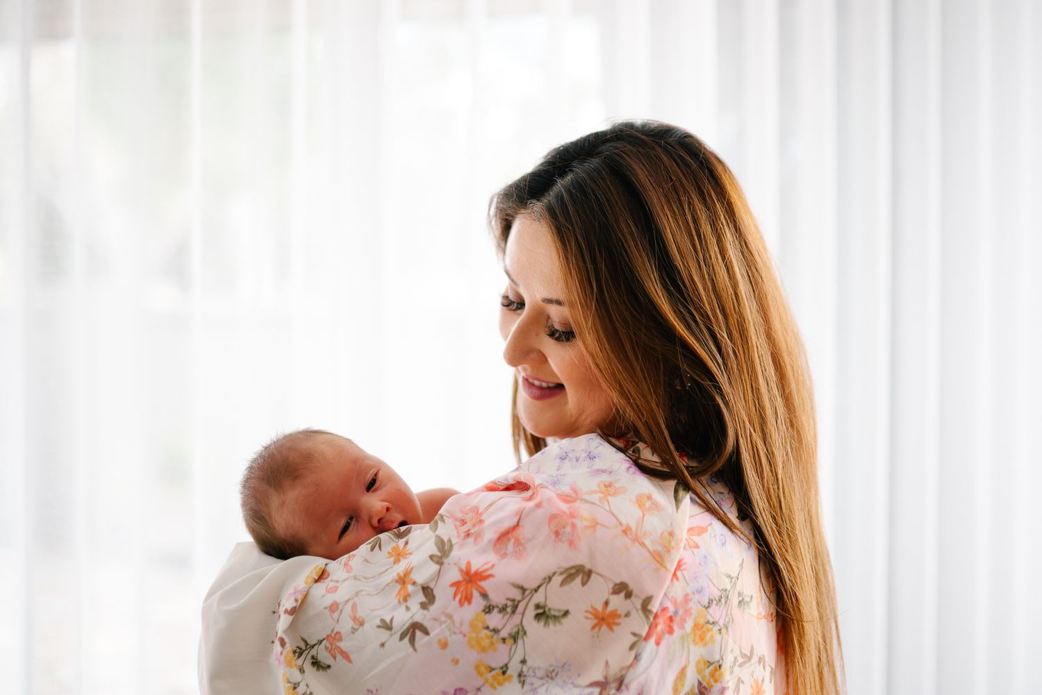 Newborn baby image during a professional photography session in natural lighting taken by Melbourne maternity and newborn photographer.
