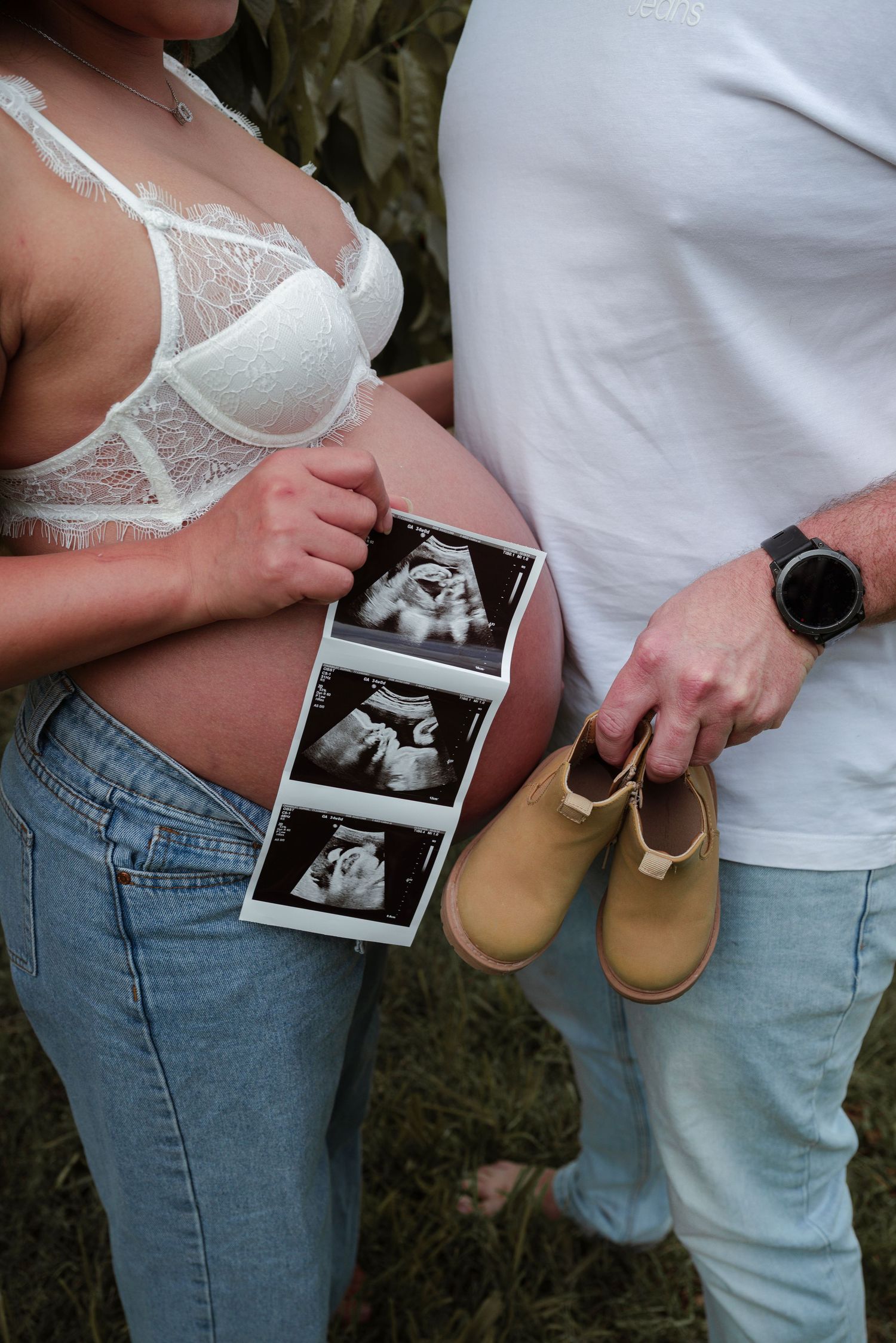 A series of photos showing a couple holding ultrasound images and baby shoes while wearing casual jeans and white tops.