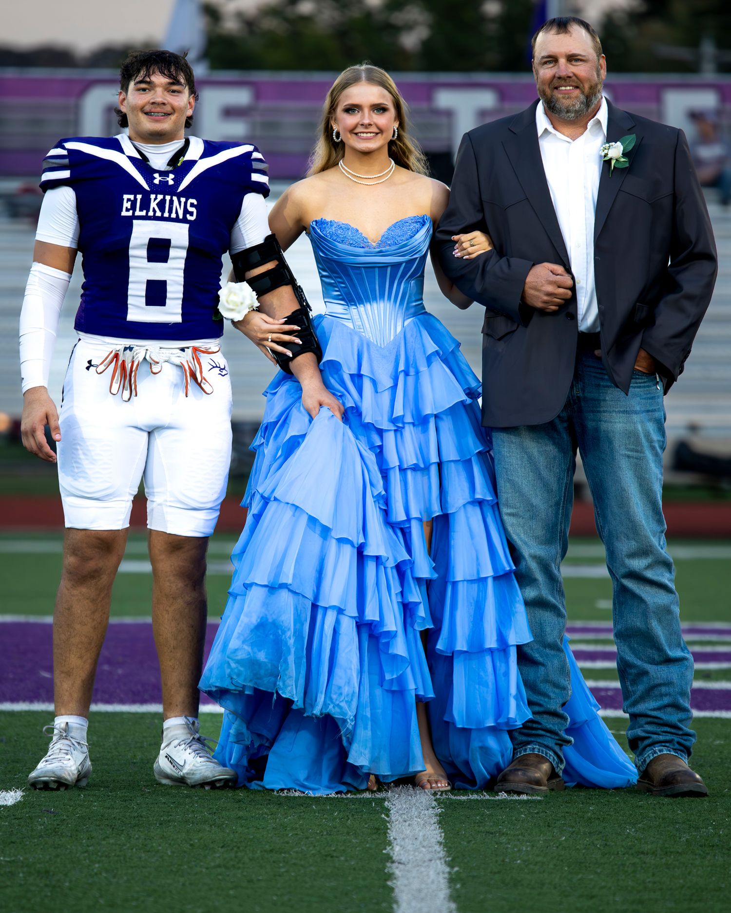 Kaylor Parsons posing at a football field at homecoming on at John Bunch Jr stadium field in Elkins AR