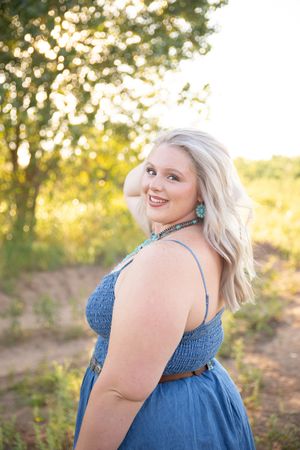 A series of outdoor portrait photos showing a person in a blue summer dress posing against a sunlit natural background.