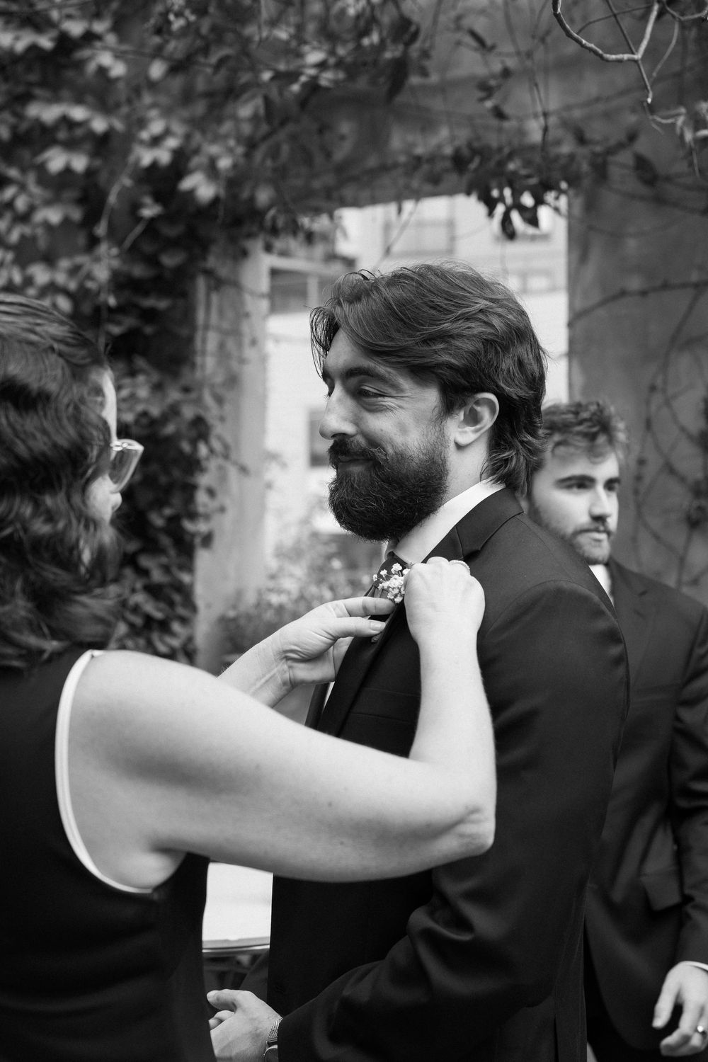 A groomsmen getting ready for a wedding at a Georgia wedding venue
