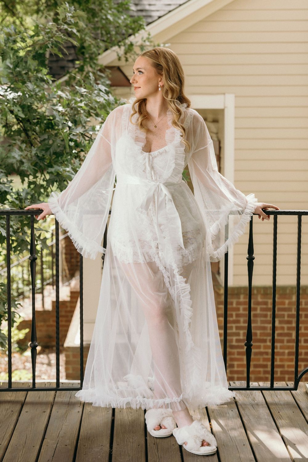 A bride posing in bridal clothes before wedding at Summerour Studio in Atlanta, Georgia