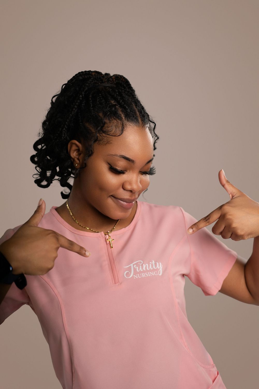 A series of poses in a pink t-shirt showing playful hand gestures against a neutral background.