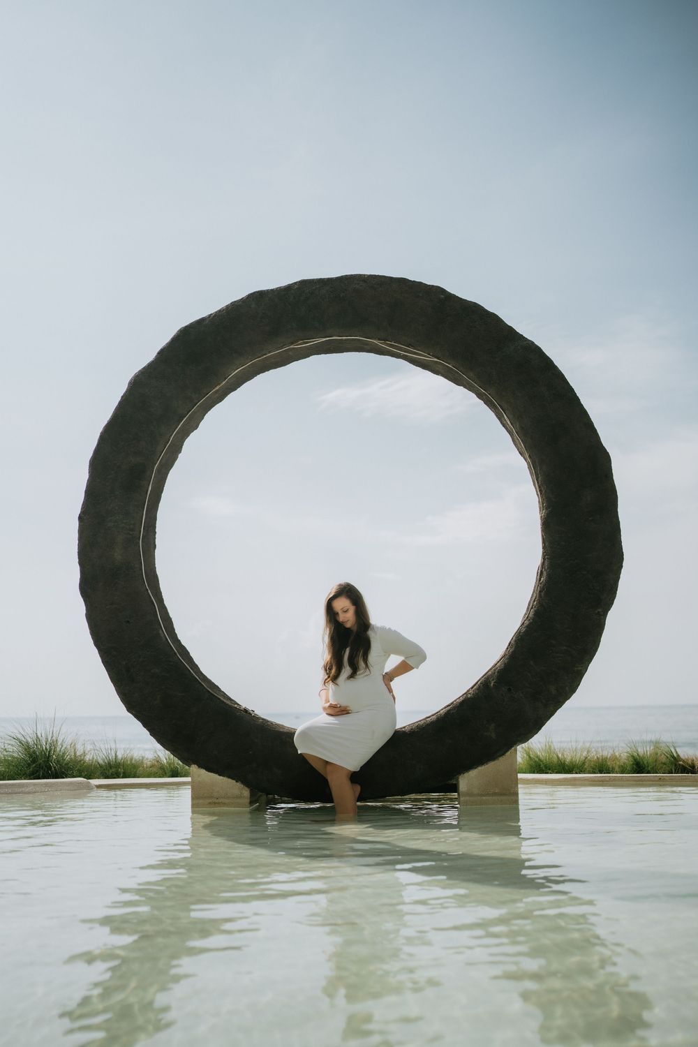 Artistic maternity photography services in Bali with soft natural light