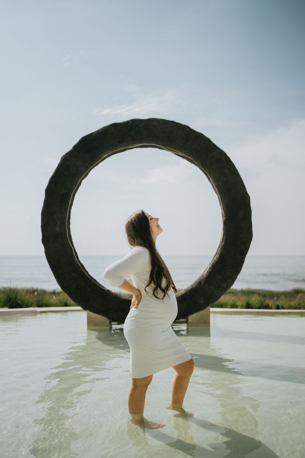 Artistic maternity photography services in Bali with soft natural light