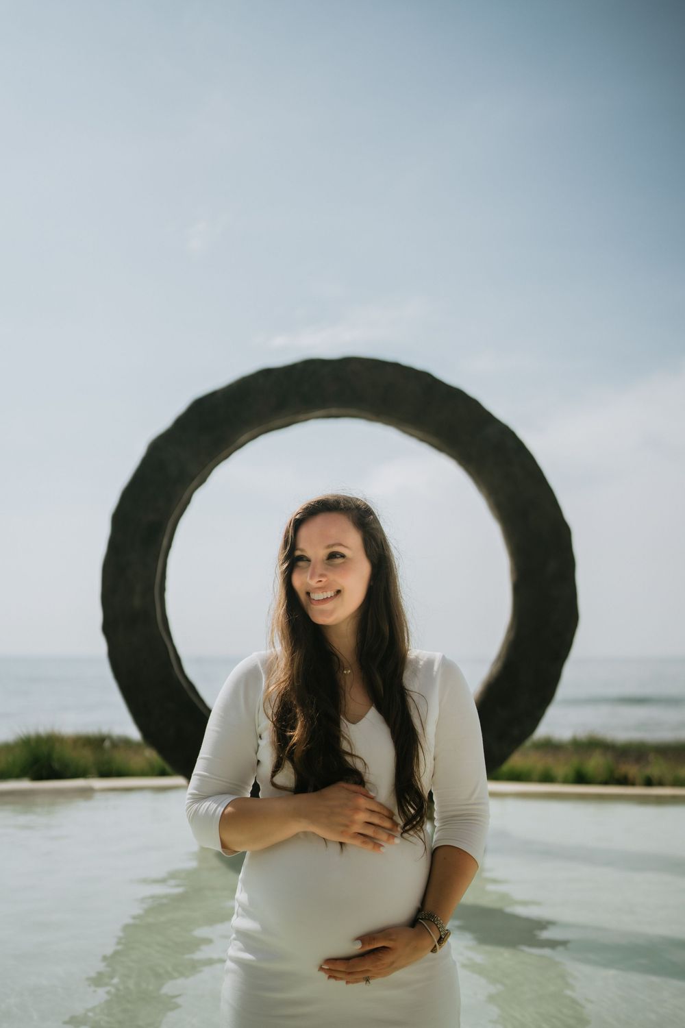 Artistic maternity photography services in Bali with soft natural light