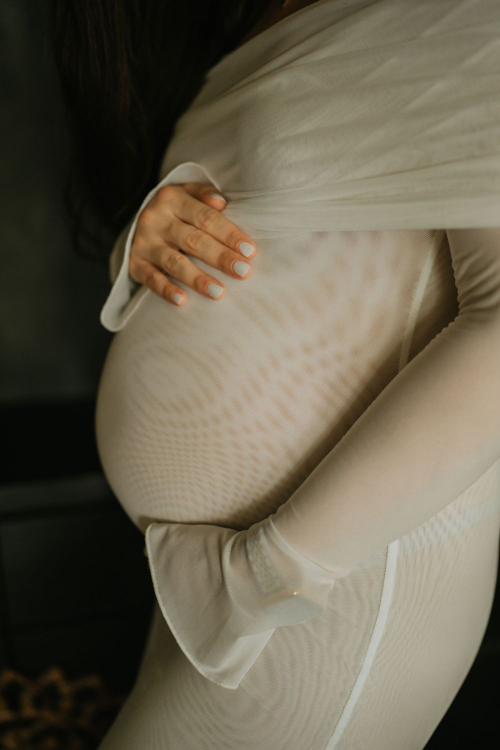 Artistic maternity photography services in Bali with soft natural light