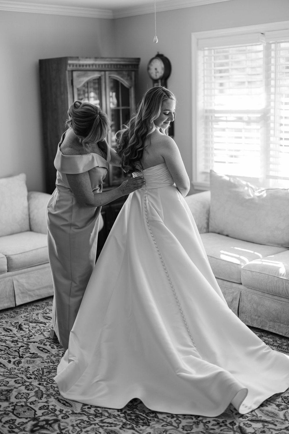 Alex's mom helps her with her Anne Barge wedding dress at a private home in Manasquan, NJ