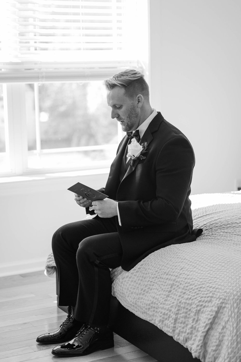 Evan reads her vows to Alex before getting ready at a private home in Point Pleasant, New Jersey.
